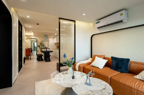Modern living room with stylish decor and open layout in a contemporary apartment.