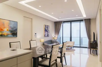 Luxurious modern living room with elegant dining area and stunning balcony view.