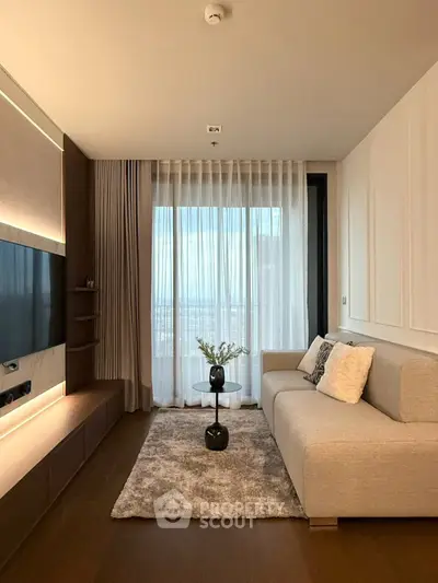Modern living room with elegant decor and large window view