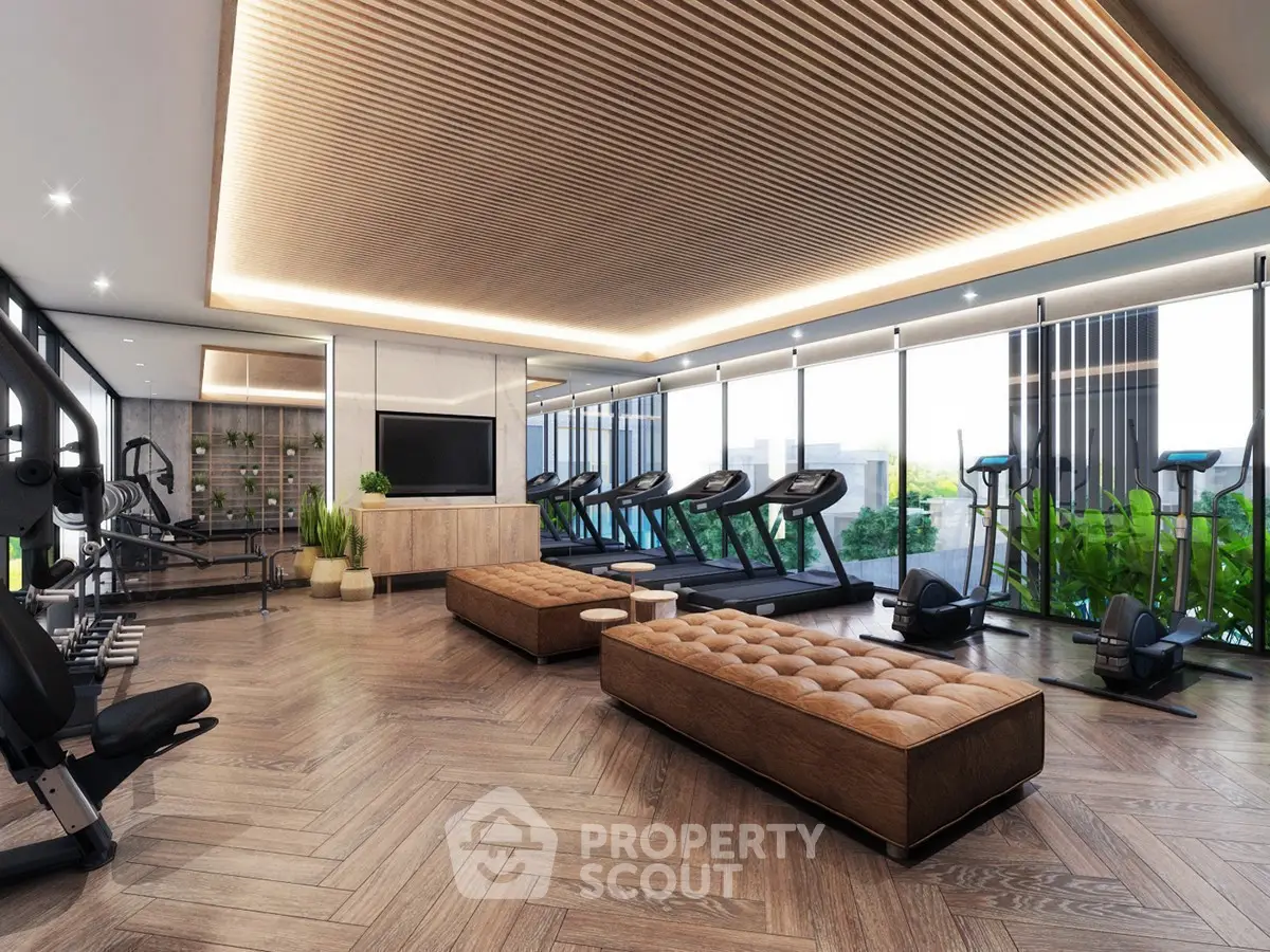 Luxurious modern gym with state-of-the-art equipment and stylish decor.
