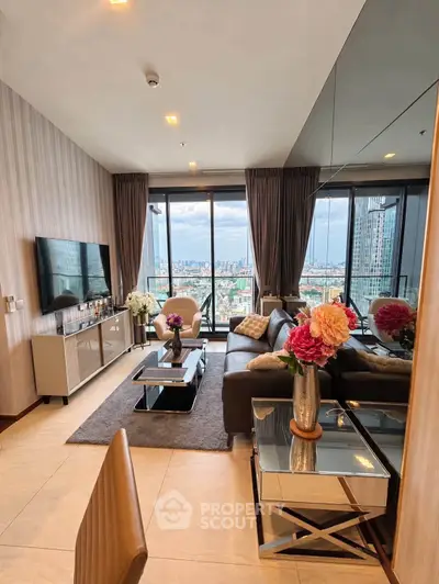 Luxurious living room with stunning city view, modern decor, and floor-to-ceiling windows.