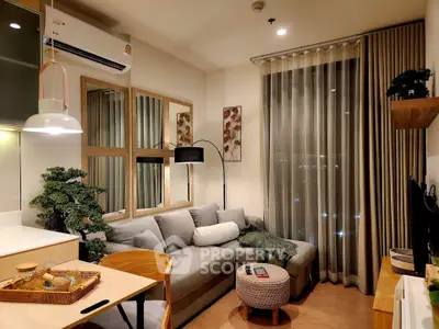 Cozy modern living room with stylish decor and ambient lighting, perfect for relaxation and entertainment.