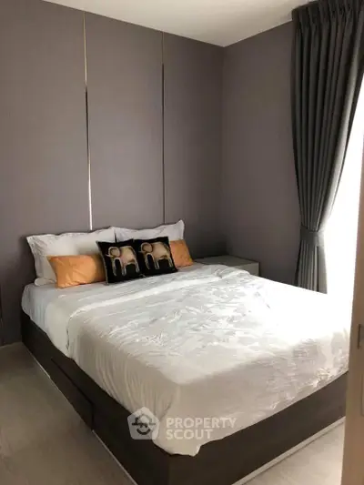 Cozy modern bedroom with elegant decor and natural light