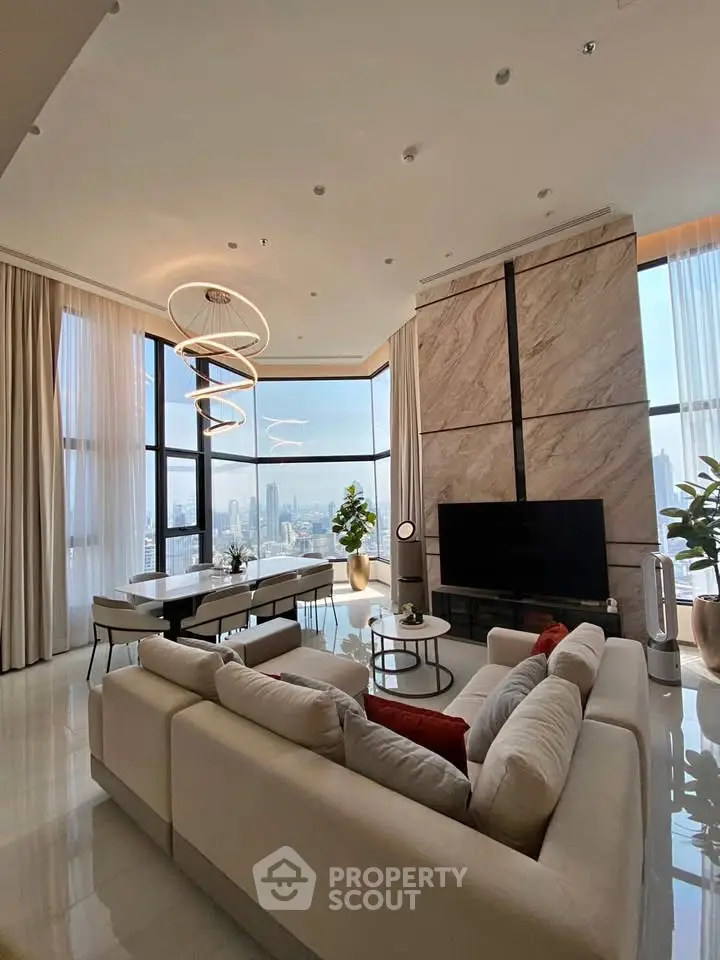 Luxurious high-rise living room with stunning city views and modern decor