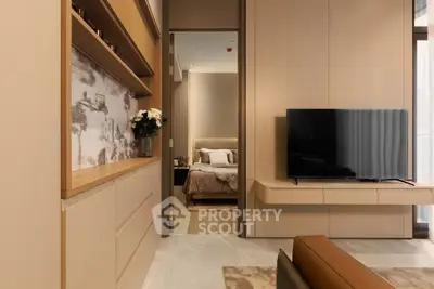 Modern living room with sleek TV setup and cozy bedroom view