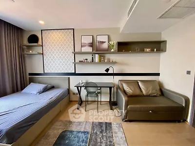 Modern studio apartment with stylish decor and cozy furnishings