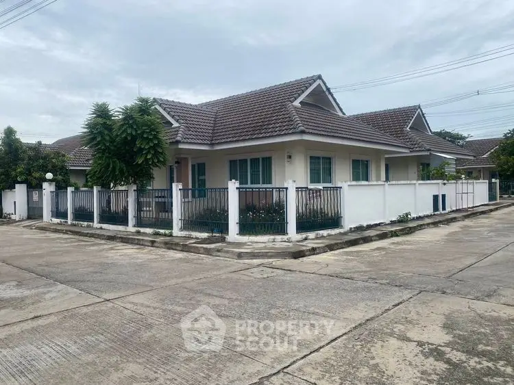 Charming single-story house with fenced yard in a serene neighborhood.