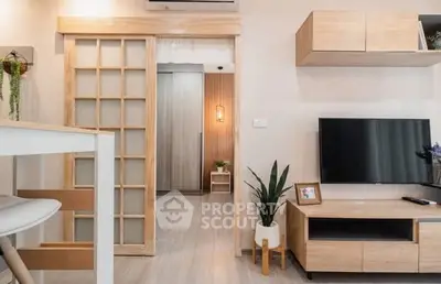 Modern living room with sliding door and stylish decor