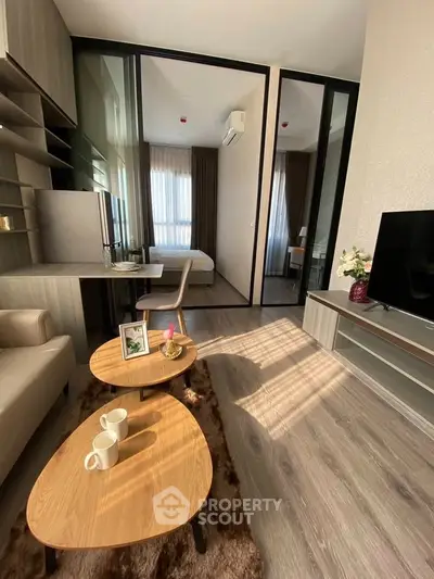 Modern living room with stylish furniture and natural light