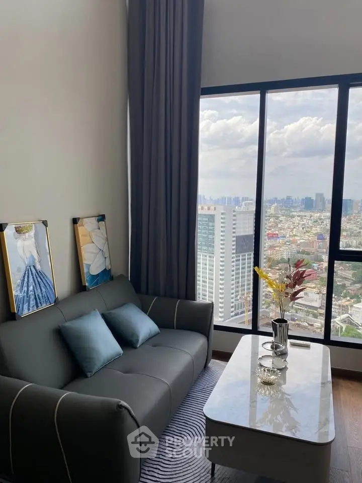 Modern living room with stunning city view and elegant decor