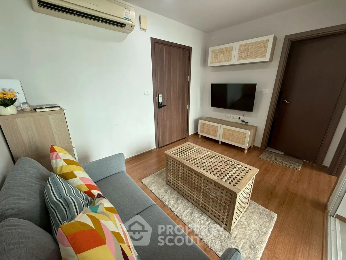 Cozy living room with modern decor and air conditioning