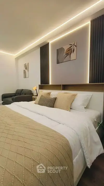 Luxurious modern bedroom with elegant lighting and stylish decor