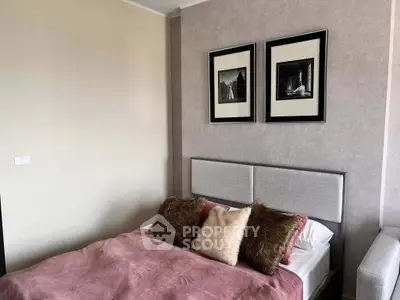 Cozy bedroom with stylish decor and plush pillows, perfect for relaxation and comfort.