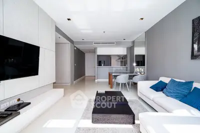Modern living room with sleek design, open layout, and stylish furniture in a contemporary apartment.