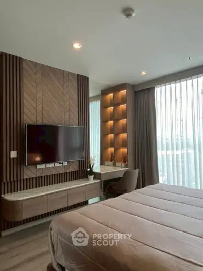 Luxurious bedroom with modern design, featuring a large window and stylish wood paneling.
