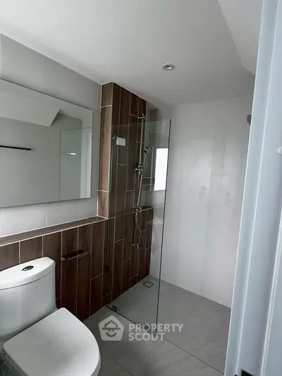 Modern bathroom with glass shower and sleek design