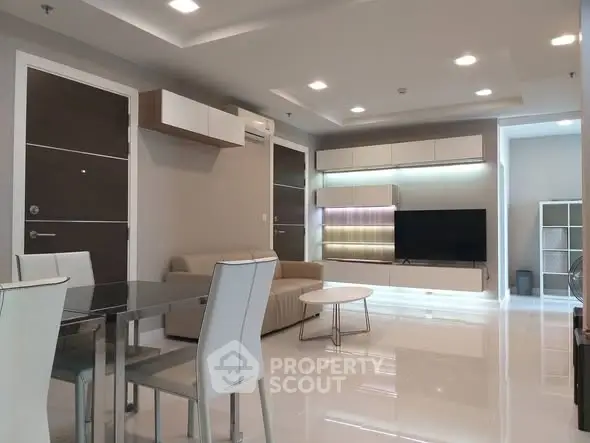 Modern living room with sleek furniture and ambient lighting