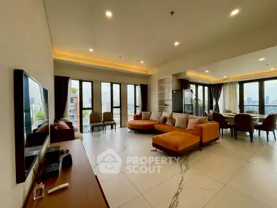 Spacious modern living room with panoramic city views and elegant furnishings