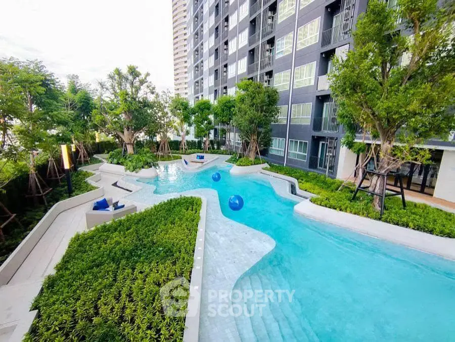 Luxurious condominium with stunning pool and lush greenery