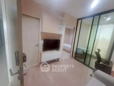 Modern apartment interior with open living space and sliding glass doors