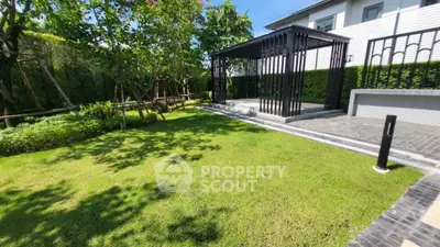 Luxurious garden with modern pergola in upscale residential property