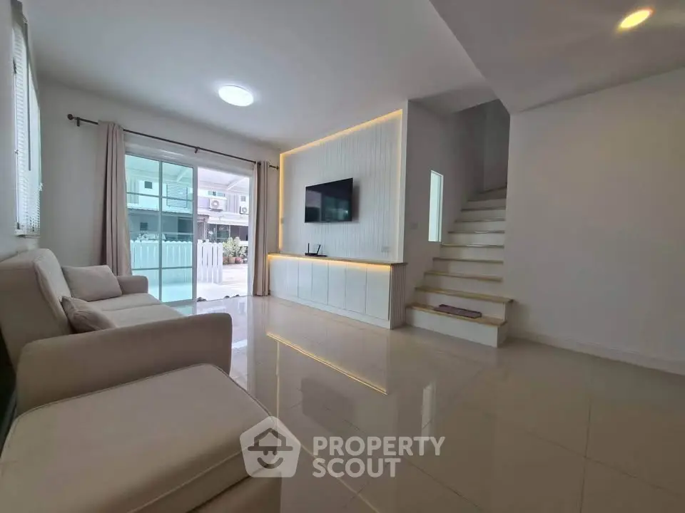 Modern living room with sleek design and natural light