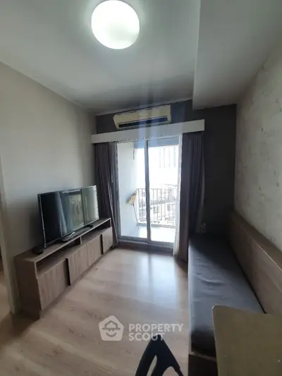 Modern living room with balcony access and stylish decor