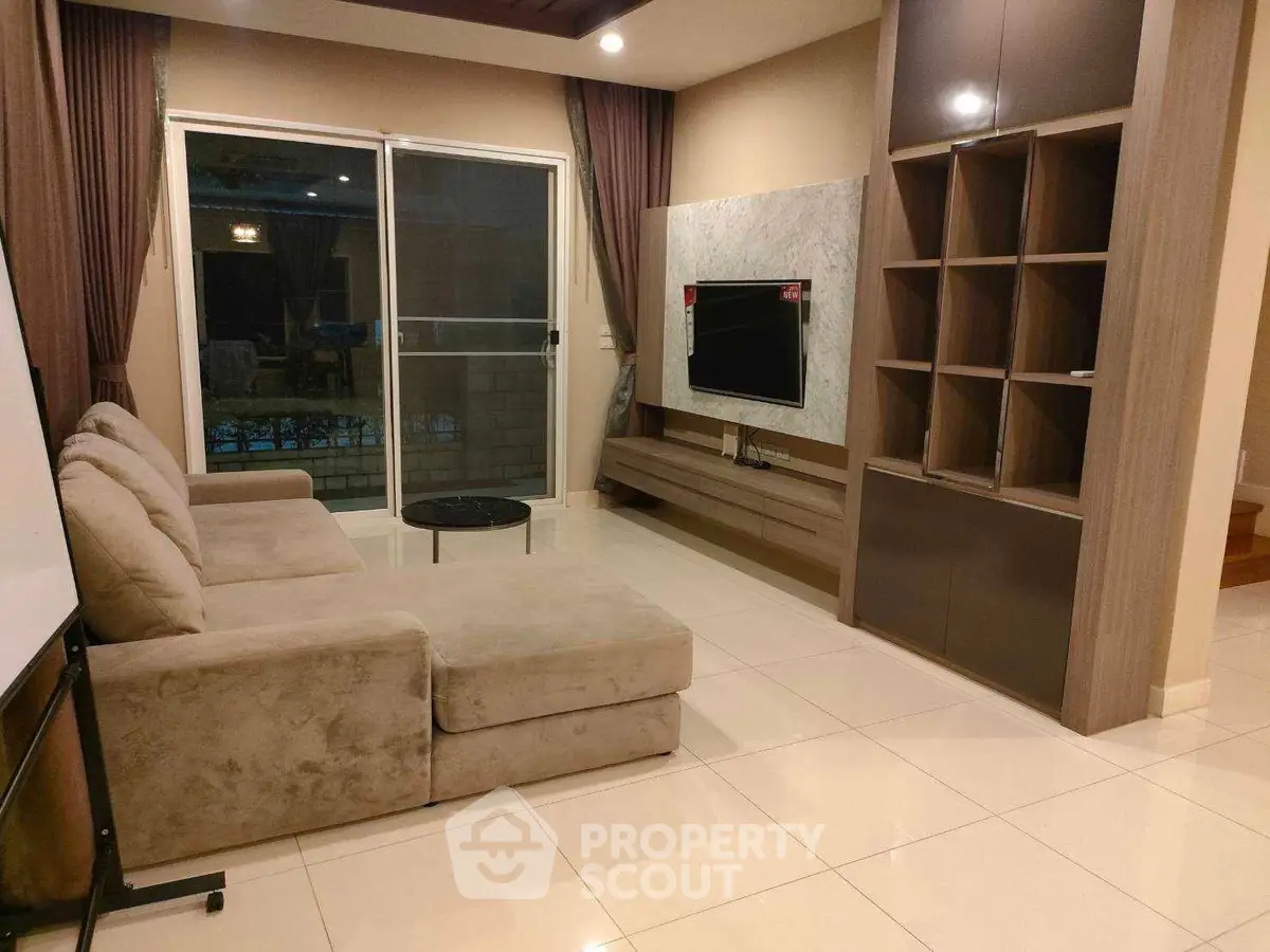 Spacious living room with modern decor and large sectional sofa