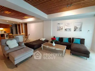 Spacious modern living room with stylish furniture and open layout