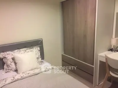 Cozy bedroom with modern wardrobe and stylish decor