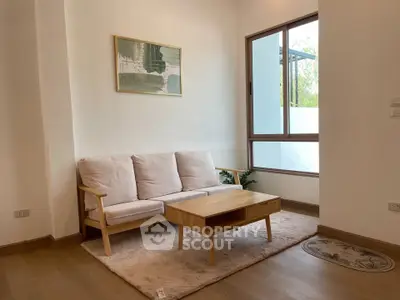Cozy living room with modern decor and natural light