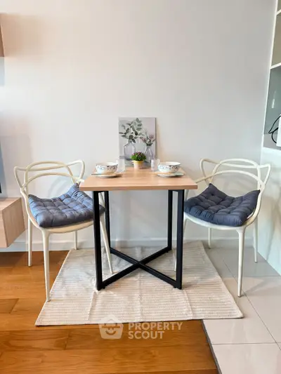 Charming dining nook with modern chairs and cozy decor