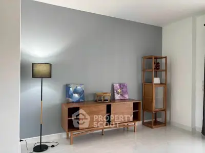 Modern living room with stylish wooden furniture and elegant decor