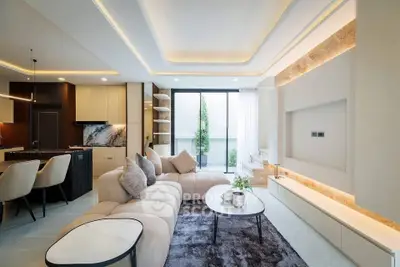 Luxurious modern living room with elegant lighting and plush furniture