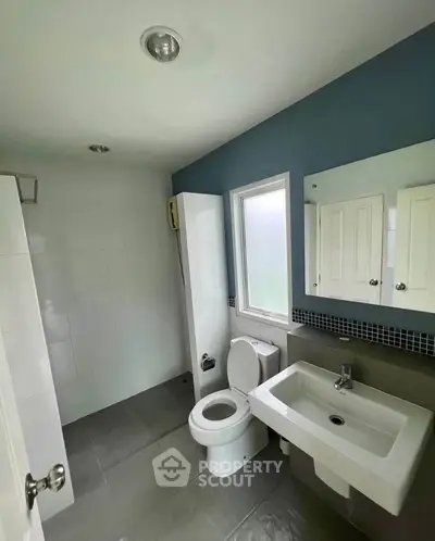 Modern bathroom with sleek fixtures and natural light
