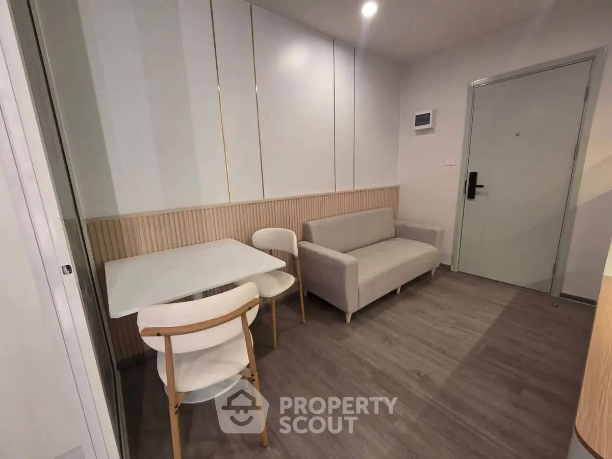 Modern minimalist living room with sleek furniture and neutral tones