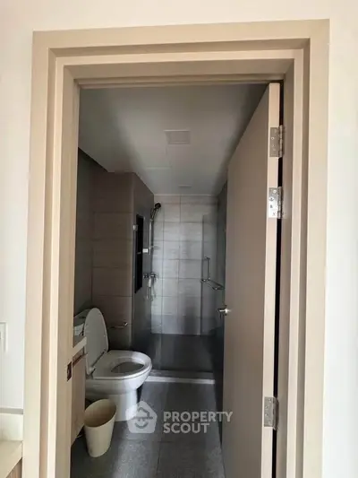 Modern bathroom with sleek design and glass shower enclosure