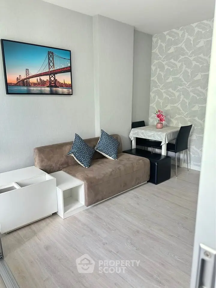 Modern living room with stylish decor and cozy seating area, perfect for relaxation and entertaining.