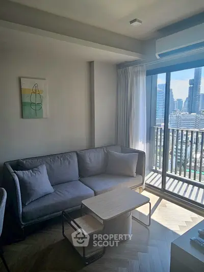 Modern living room with city view and stylish furniture