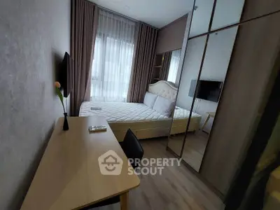 Modern bedroom with elegant decor and natural light