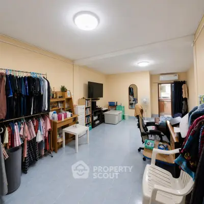 Spacious living room with modern decor and ample storage space