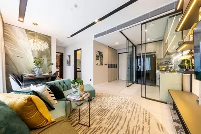 Luxurious modern living room with open kitchen and elegant decor