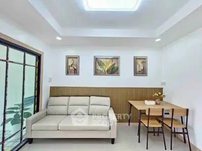 Modern living room with stylish decor and cozy seating area