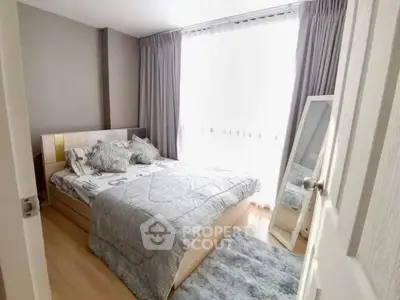 Cozy bedroom with natural light and stylish decor