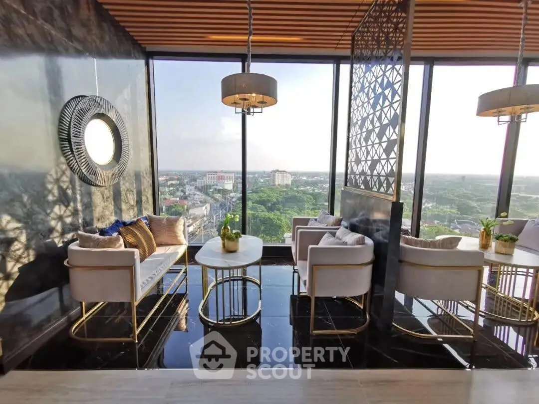 Luxurious living room with panoramic city view and elegant modern decor.