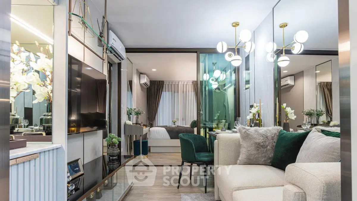 Luxurious modern living room with elegant decor and open view into stylish bedroom.