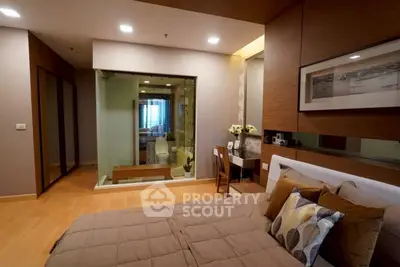 Modern bedroom with ensuite bathroom and stylish decor