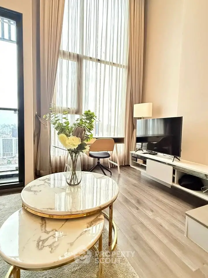 Luxurious high-ceiling living room with modern decor and city view.