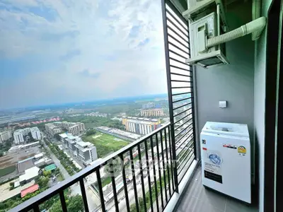 Stunning high-rise balcony with panoramic city views and modern washing machine.
