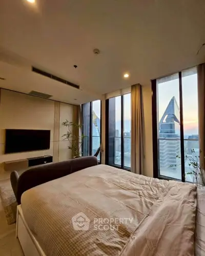 Luxurious bedroom with stunning city view and modern decor